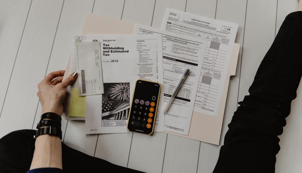 Construction office reviewing invoices